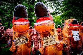 World Biodiversity Day Protest In Dinosaur Costumes - The Hague