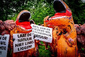 World Biodiversity Day Protest In Dinosaur Costumes - The Hague