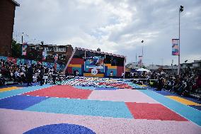 Roger Federer performs during the inauguration of a tennis court in Courneuve north Paris FA