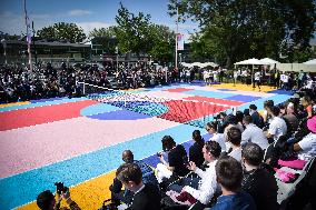 Roger Federer performs during the inauguration of a tennis court in Courneuve north Paris FA