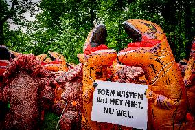 World Biodiversity Day Protest In Dinosaur Costumes - The Hague