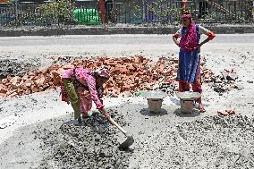 Daily Woman Labor In Dhaka.