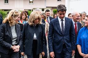 PM Attal And First Lady Brigitte Macron Visit Suburban School