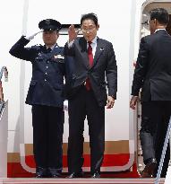 Japan PM Kishida departs for trilateral summit in Seoul