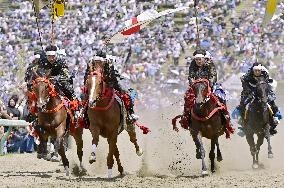 Armored warriors compete in horse race