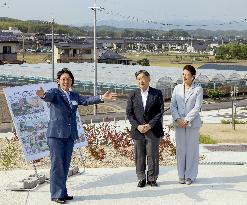 Japanese emperor, empress visit flood-hit area in Okayama
