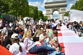 Grand picnic on the Champs-Elysees in Paris FA