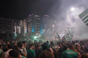 Fans Of Panathinaikos Celebrate Winning The Euroleague Trophy.