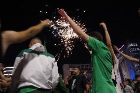 Fans Of Panathinaikos Celebrate Winning The Euroleague Trophy.