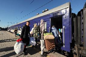 Evacuees from Kharkiv region depart on vacation