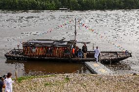 Olympic Flame Passes Through Maine Et Loire - France