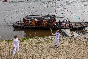 Olympic Flame Passes Through Maine Et Loire - France