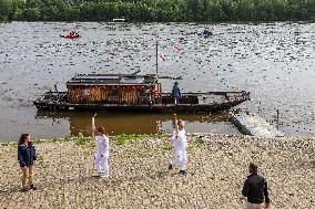 Olympic Flame Passes Through Maine Et Loire - France