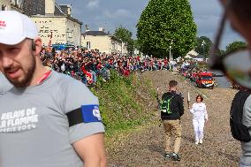 Olympic Flame Passes Through Maine Et Loire - France