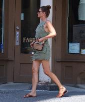 Helena Christensen Shows Off Her Legs - NYC