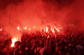 Fans Of Olympiacos Are Watching The Conference Cup Final.