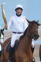 The Olympic Flame Makes A Stop On Omaha Beach - Normandy