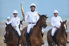 The Olympic Flame Makes A Stop On Omaha Beach - Normandy