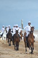 The Olympic Flame Makes A Stop On Omaha Beach - Normandy