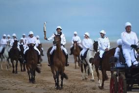 The Olympic Flame Makes A Stop On Omaha Beach - Normandy
