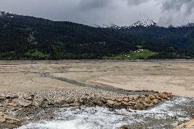 Reschensee Lake Drained for Alpine Road Construction