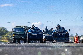 Gendarmes Clear A Roadblock - New Caledonia