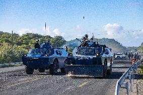 Gendarmes Clear A Roadblock - New Caledonia