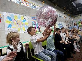 Celebrating end of academic year at Kharkiv metro school