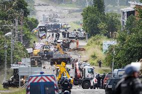 Police Forces Removing Blockage On Rue Iekawe In Noumea