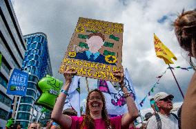 Climate March Held Along The Business District In The City Of Amsterdam.