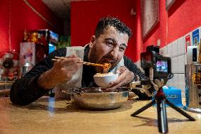 "Laowai" in China | Iraqi food vlogger gains millions of fans in China