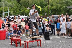 Street Performer Entertains A Crowd In Unionville