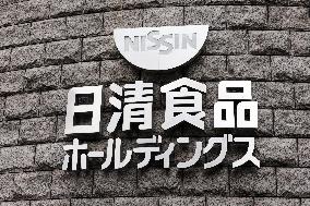 Exterior view, logo and signage of NISSIN FOODS HOLDINGS CO., LTD.