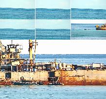 CHINA-REN'AI JIAO-PHILIPPINE NAVY PERSONNEL-ILLEGALLY GROUNDED SHIP-CHINESE FISHMEN'S NETS-DAMAGE(CN)