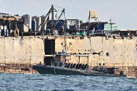 CHINA-REN'AI JIAO-PHILIPPINE NAVY PERSONNEL-ILLEGALLY GROUNDED SHIP-CHINESE FISHMEN'S NETS-DAMAGE(CN)