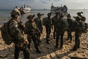 French Navy's Mistral Conducts Amphibious Landing On Omaha Beach