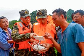 Flood Waters Surround Shilong Village in Hechi