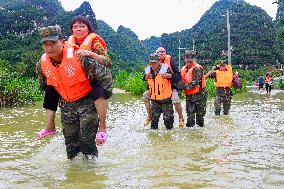 Flood Waters Surround Shilong Village in Hechi