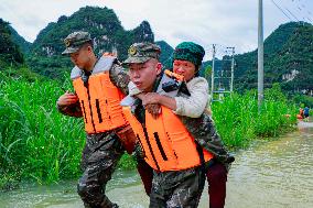 Flood Waters Surround Shilong Village in Hechi