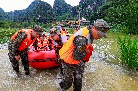 Flood Waters Surround Shilong Village in Hechi