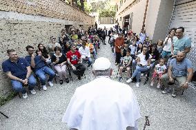 Surprise Visit of Pope Francis To Families In Garage of A Building - Rome