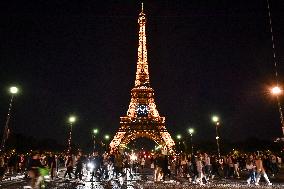 The Olympic rings are illuminated on the Eiffel Tower in Paris FA