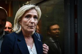 Marine Le Pen exits after a meeting with Marion Marechal and Jordan Bardella at the Rassemblement National headquarters in Paris