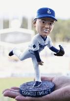 Baseball: Dodgers pitcher Yamamoto's bobblehead doll