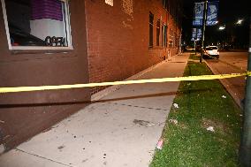 Two People Shot While Standing On The Sidewalk In Chicago Illinois