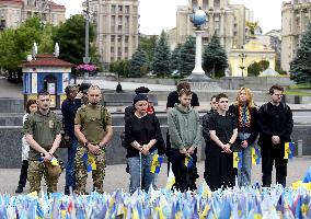 LGBT activists pay tribute to late defenders of Ukraine in Kyiv