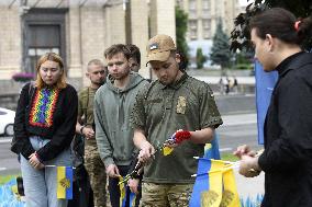 LGBT activists pay tribute to late defenders of Ukraine in Kyiv