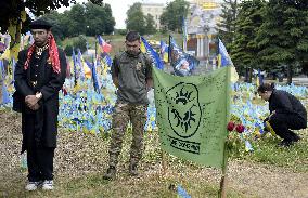 LGBT activists pay tribute to late defenders of Ukraine in Kyiv