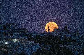 Strawberry Moon Graces Aleppo's Sky
