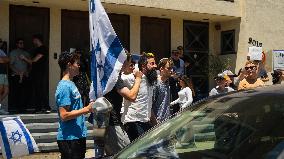 Pro Palestine And Pro Israel Crowds Clash Outside Of Adas Torah During A Sale Of Land In Israel